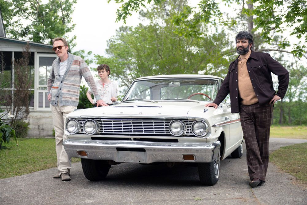 Paul Bettany, Sophia Lillis, and Peter Macdissi in "Uncle Frank." © Amazon / Courtesy Everett Collection