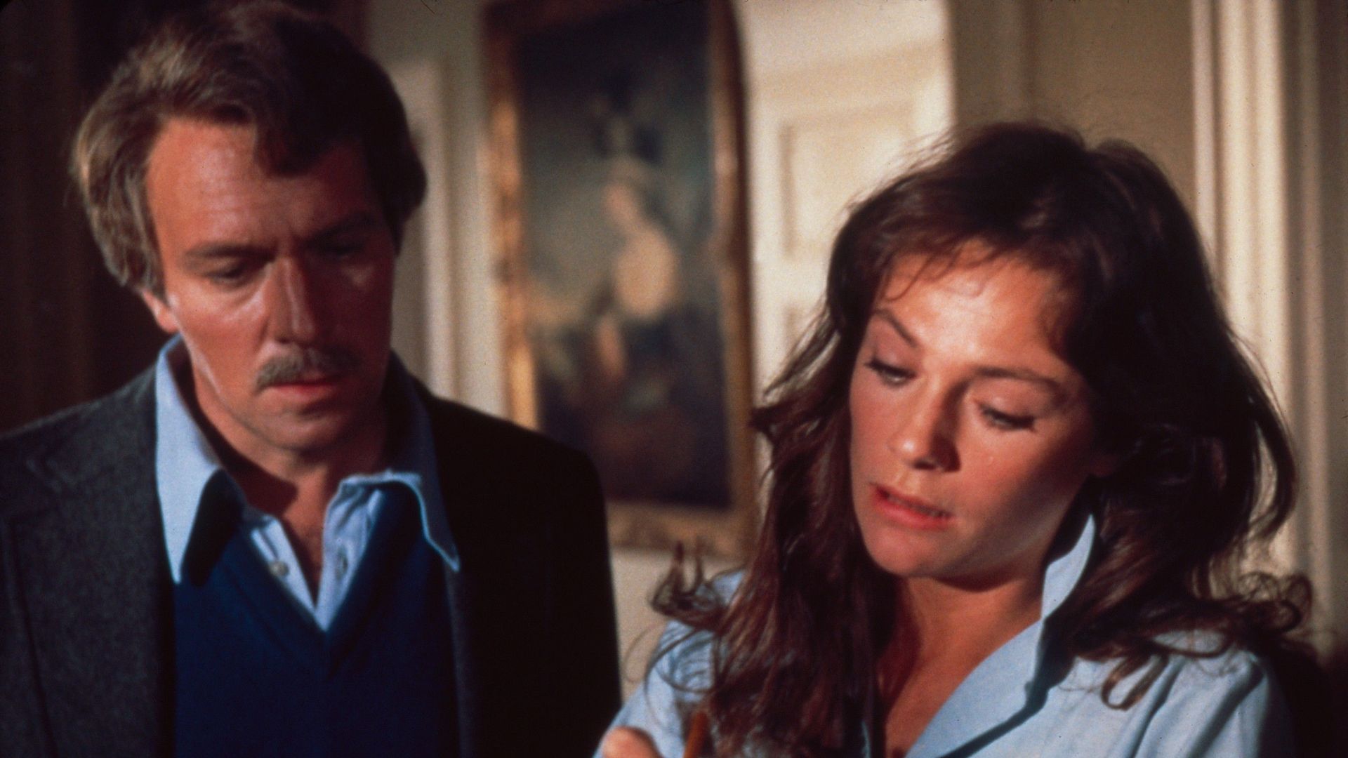 THE SPIRAL STAIRCASE, from left: Christopher Plummer, Jacqueline Bisset, 1975.