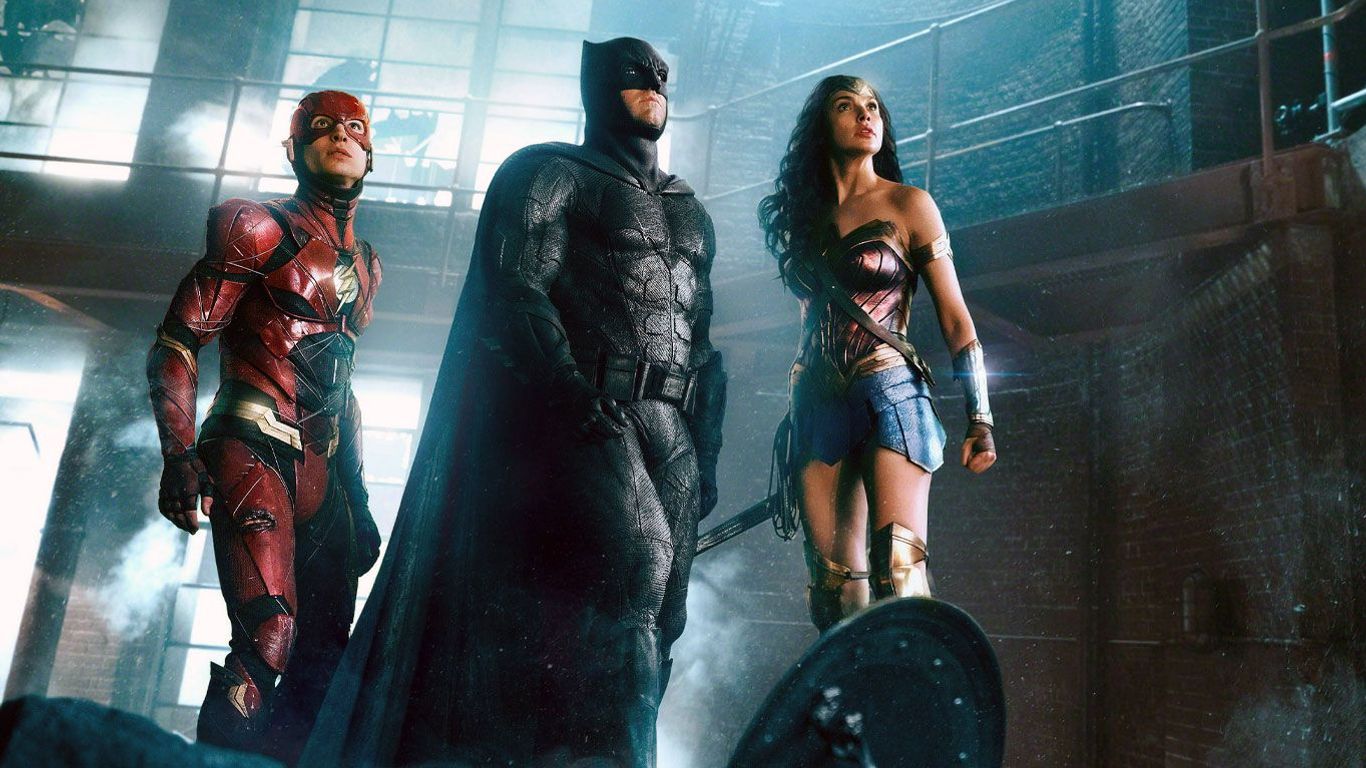 Ezra Miller as The Flash, Ben Affleck as Batman, Gal Gadot as Wonder Woman in "Justice League."