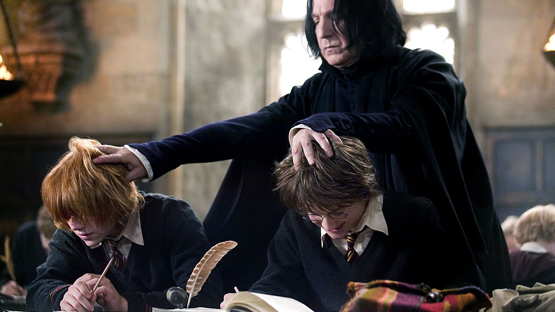 Rupert Grint, Alan Rickman and Daniel Radcliffe in "Harry Potter and the Goblet of Fire."